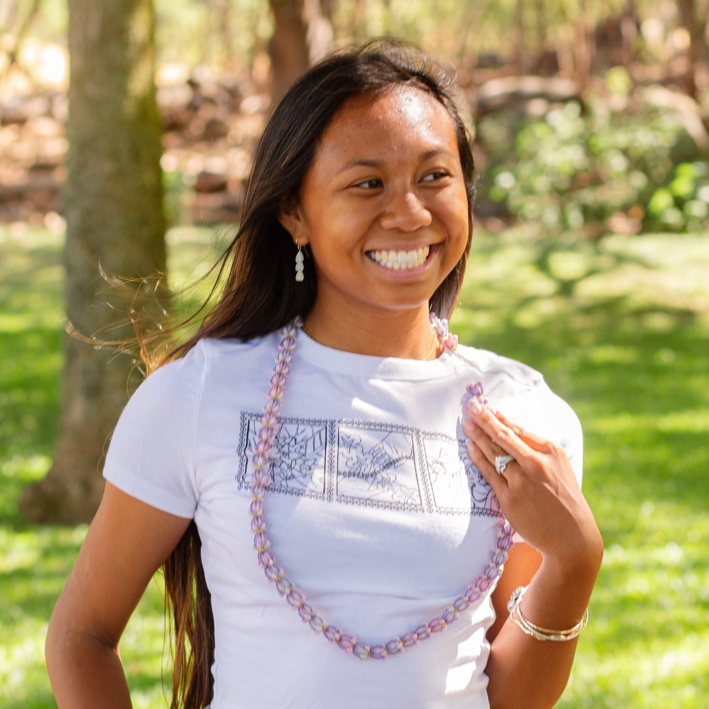 Lei of Love- White Crown Flower Cropped Baby Tee