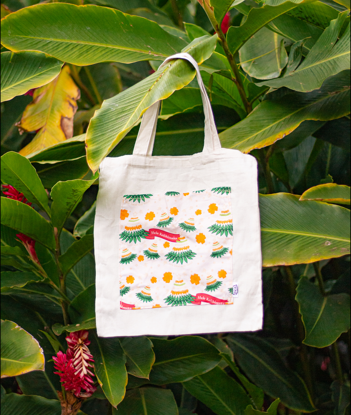 Mele- Mele Kalikimaka Pocket Tote Bag